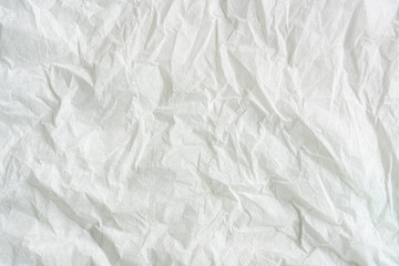 white color creased paper tissue background texture.