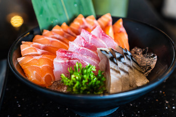 Salmon,tuna,saba sashimi, raw fish in traditional Japanese style in Japanese restaurant. - obrazy, fototapety, plakaty