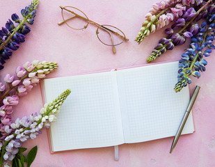 Mockup notebook with lupine flowers
