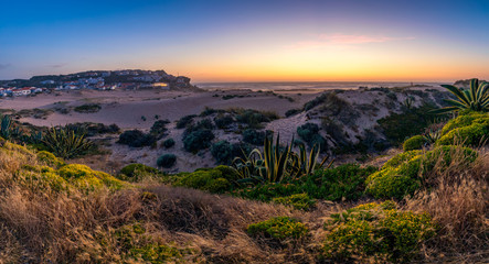 Naklejka na ściany i meble View of the Monte Clerigo beach on the western coastline of Portugal, Algarve. Stairs to beach Praia Monte Clerigo near Aljezur, Costa Vicentina, Portugal, Europe.