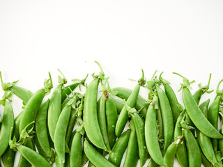 green pea pod on white background