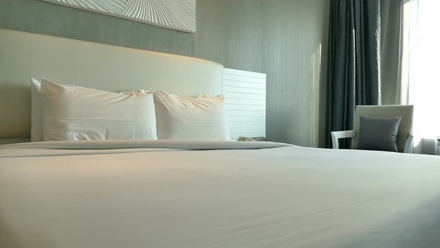 Decoration of pillow on bed in bedroom interior 