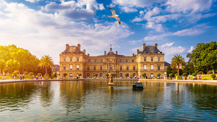 The Luxembourg Palace in The Jardin du Luxembourg or Luxembourg Gardens in Paris, France. Luxembourg Palace was originally built (1615-1645) to be the royal residence of the regent Marie de Medici. - obrazy, fototapety, plakaty