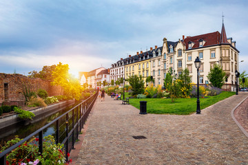 Colmar, Alsace, France. Petite Venice, water canal and traditional half timbered houses. Colmar is...