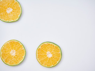 Sliced ​​oranges on a white background