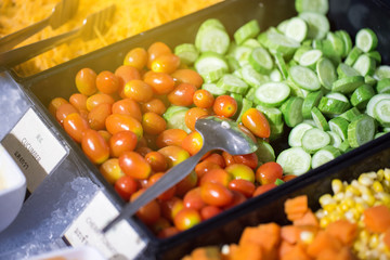 Colorful vegetale with fruit in salad bar dinner meal