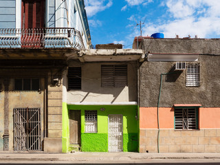 Street scene with colorful buildings in Havana, Cuba.