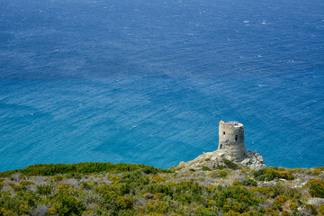 Fototapeta premium The Tower of Agnellu, a Genoese tower located in the commune of Rogliano (Haute-Corse). Sentier des douaniers. Corsica, France