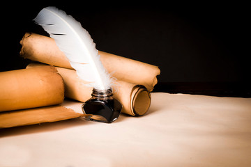 Scroll of papyrus, and a pen and inkwell