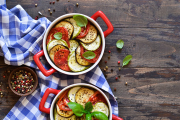 Village dinner - baked vegetables with olive oil and spices. Ratatouille.