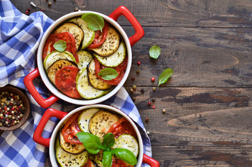 Village dinner - baked vegetables with olive oil and spices. Ratatouille.
