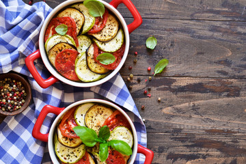 Village dinner - baked vegetables with olive oil and spices. Ratatouille.