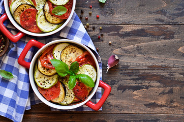 Village dinner - baked vegetables with olive oil and spices. Ratatouille.