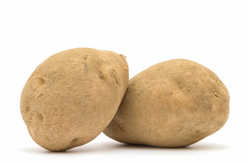 Fototapeta premium Potatoes with dirt isolated on white background