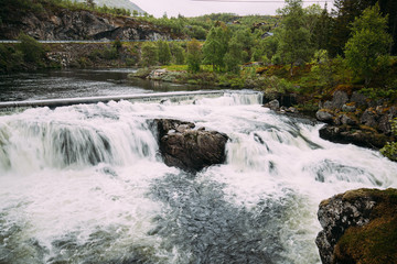 Voringsfoss, Bjoreio river, Norway. Waterfall Voringsfoss In Summer Landscape. European Nature
