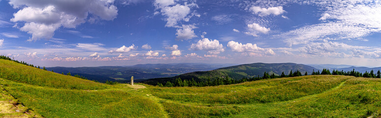 Fototapeta premium Mountains view from Kralicky Sneznik (Mount Sneznik - 1424 m), Poland and Czech Republic border