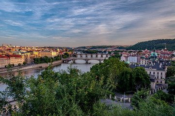 Fototapeta na wymiar Scenic view over Prague bridges and Vltava River from Letna Hill at dusk. Beautiful view of Prague's Old Town. Prague, Czech Republic