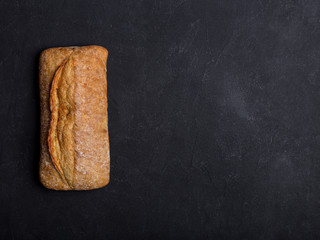 Loaf of bread on dark background