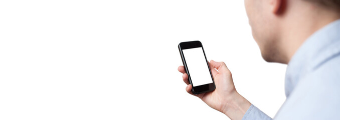 Mobile phone in the hand isolated on white background. Copy space. Mock up