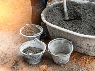 Cement mix concrete in basin in construction site