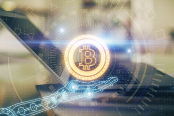 Obraz premium Double exposure of blockchain and crypto economy theme hologram and table with computer background. Concept of bitcoin cryptocurrency.