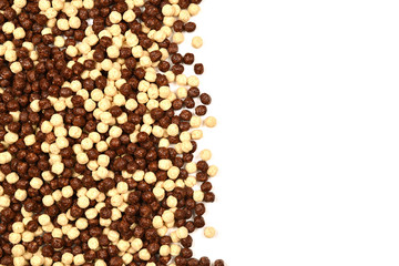 Frame of chocolate corn flakes  isolated on white background.