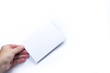 Man hands holding blank paper, white empty business card or flyer on white background. Showing blank signboard with copy space area