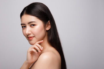 Portrait of beautiful young asian woman clean fresh bare skin concept. Asian girl beauty face skincare and health wellness, Facial treatment, Perfect skin, Natural make up. Isolated on gray background