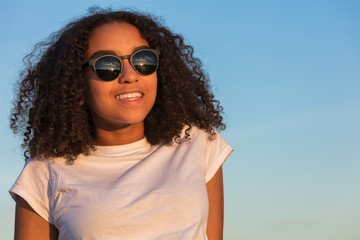 Young Woman Girl Teenager Wearing Sunglasses at Sunset