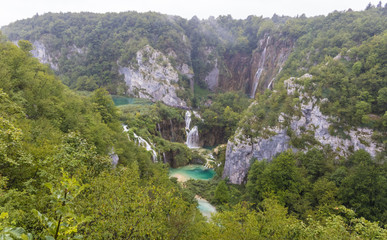 Fototapeta na wymiar Plitvice lakes national park in Croatia view with the waterfalls and rocks - Image