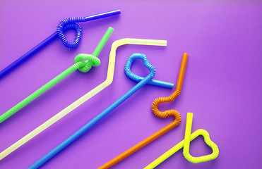 Colour plastic cocktail tubes with a flexible part, due to which they can be twisted into a knot or...