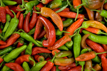 varieties of peppers, red, green, orange, thin, used as spices or grilled, at local vegetable market, agriculture, food, vitamins, nourishment, summer, background, Milan, Italy