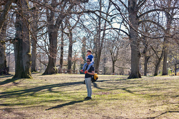Father and son in a Slottsskogen park, Gothenborg, Sweden