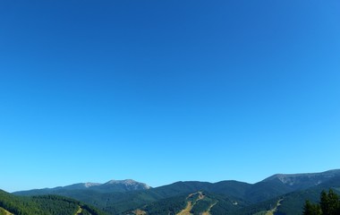 Mountains on a blue sky background