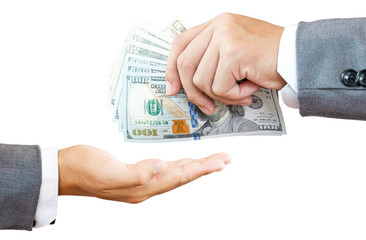 One Businessman holding USD banknote for payment and one hand take .US dollar is main and popular currency of exchange in the world. Investment and saving concept.