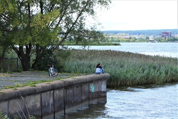 city pond, bike and girl