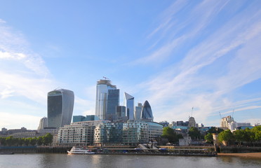 Fototapeta premium Downtown office buildings along Thames river cityscape London England