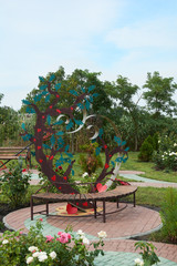 Bench for lovers. Installation on the theme of love, weddings in the park of lovers of hearts, Dobroslav, Ukraine.