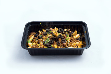 Take-Away Hot Loaded fries / chips with ground meat, olives, cheese, jalapeno, sauce & oregano., on a minimal white background with a 45 degree angle from zoomed out frontal perspective.