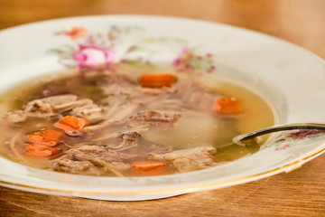 Beef soup on plate