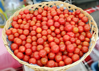 Cherry tomatoes. Fresh organic cherry tomatoes background. Tomatoes pattern