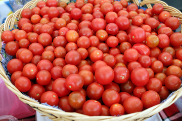 Cherry tomatoes. Fresh organic cherry tomatoes background. Tomatoes pattern