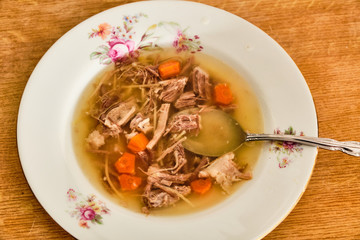 Beef soup on plate