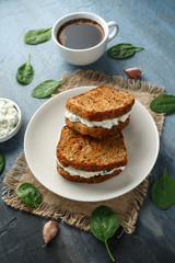 Ricotta cheese spinach sandwich with coffee. healthy breakfast