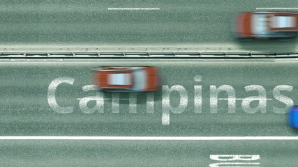 Overhead view of the busy car road with Campinas text. Travel to Brazil intro clip