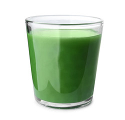 Glass of fresh wheat grass juice on white background