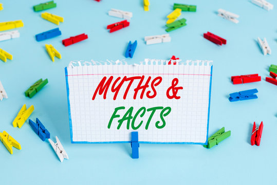 Text sign showing Myths And Facts. Business photo showcasing usually traditional story of ostensibly historical events Colored clothespin papers empty reminder blue floor background office pin