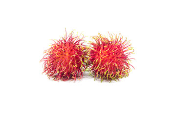Two rambutan fruit isolated on white background.