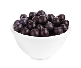 Ceramic bowl with fresh acai berries on white background