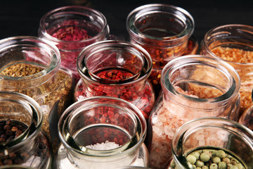assortment of spices in glass on table. Food and cuisine ingredients and peppers